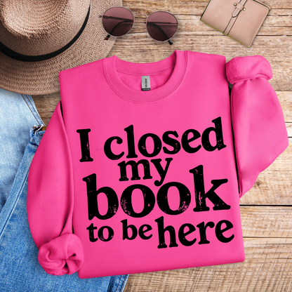 I Closed My Book To Be Here Women’s Crewneck